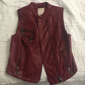 Red, faux leather vest from Guess.
